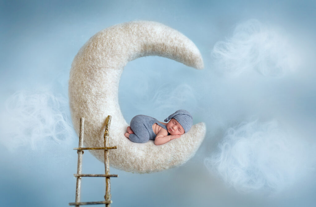 Burlington newborn photographer creating a magical moon-themed composite of a newborn baby boy.