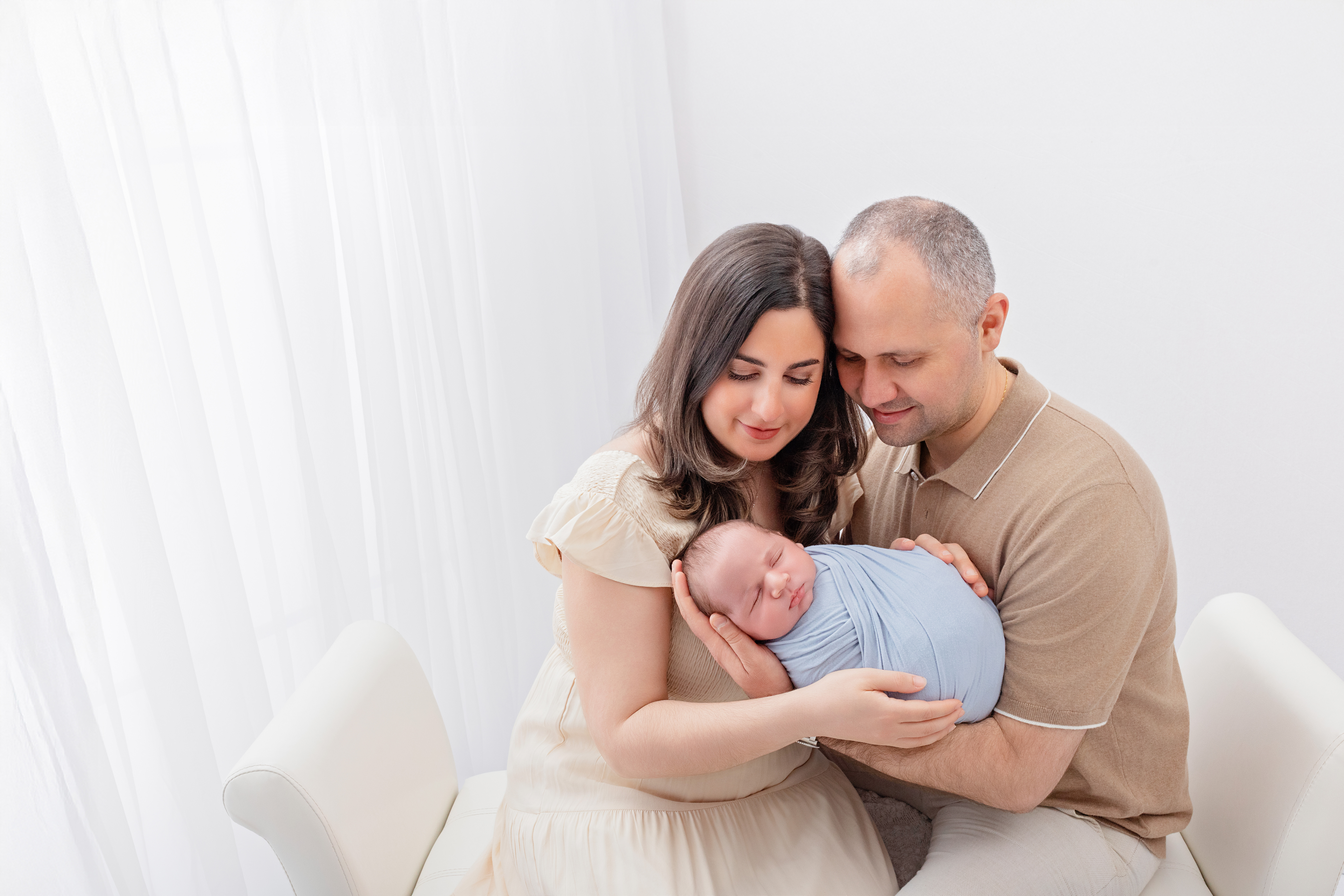 Burlington newborn photographer creating a bright, airy family portrait during a Platinum Newborn Session.