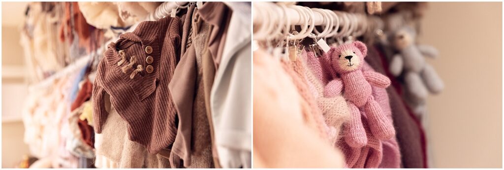 Close-up of newborn outfits and knitted accessories hanging inside McLelland Photography’s Oakville studio wardrobe.