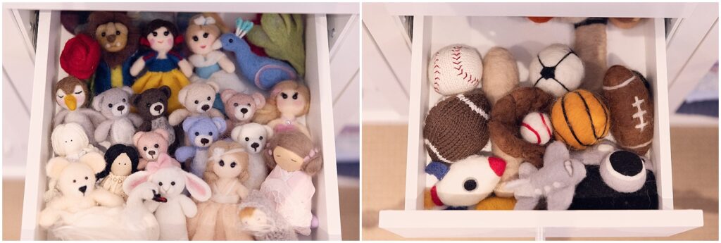 Drawer filled with themed newborn photography props including stuffed animals and sports items in our Oakville studio.