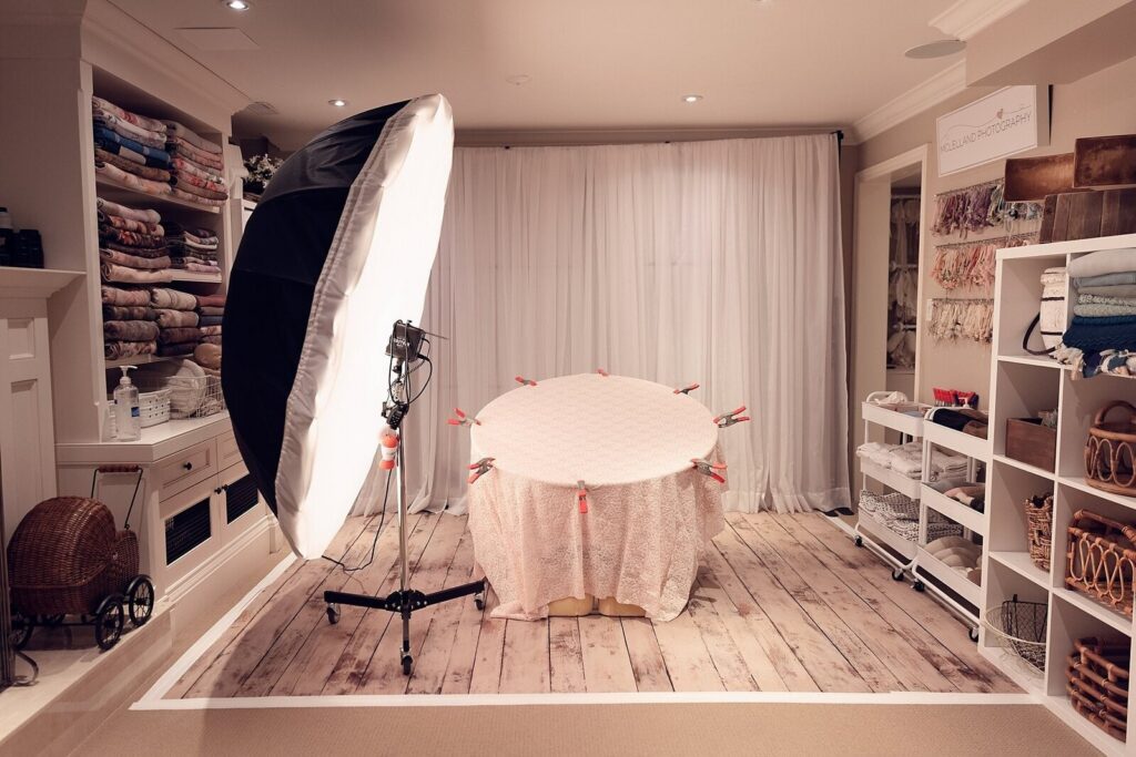 Warm and fully equipped studio setup for an Oakville newborn photography session at McLelland Photography. 